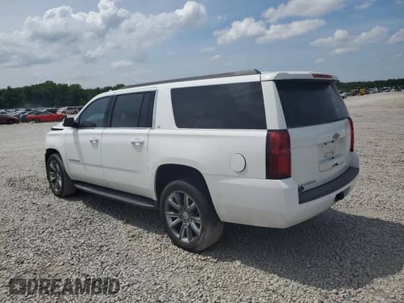 2020 Chevrolet Suburban LT z VIN 1GNSCHKC3LR167806, wystawiony jako Copart lot #59787085 z przebiegiem Nie podano mil oraz Szkoda całkowita • Salvage title. Historia ofert i sprzedaży dostępna na DreamBid. Obrazek 2.