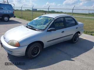1999 Chevrolet Metro Lsi z VIN 2C1MR5222X6710860, wystawiony jako IAAI lot #42653198 z przebiegiem 75 087 mil mil oraz . Historia ofert i sprzedaży dostępna na DreamBid. Obrazek 2.