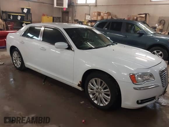 2013 Chrysler 300 with VIN 2C3CCARG6DH505220, listed as a IAAI auction lot 41944437 with 196,548 mi miles and . Bid and sale history available at DreamBid. Image 1.