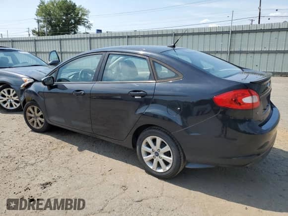 2012 Ford Fiesta SE с VIN 3FADP4BJ7CM186363, выставлен на аукционе Copart как лот 70279645 с пробегом 147 483 миль миль и Списание • Salvage title. История ставок и продаж доступна на DreamBid. Изображение 2.