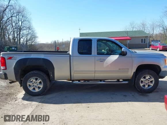 2011 GMC Sierra 1500 SLT with VIN 1GTR2WE35BZ366073, listed as a IAAI auction lot 42067268 with 309,504 mi miles and . Bid and sale history available at DreamBid. Image 14.