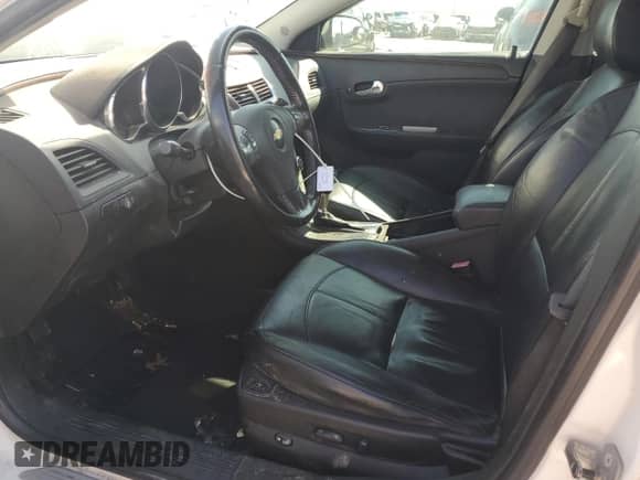 2010 Chevrolet Malibu LTZ with VIN 1G1ZE5EB2AF269026, listed as a Copart auction lot 70077135 with 194,782 mi miles and Salvage title. Bid and sale history available at DreamBid. Image 7.