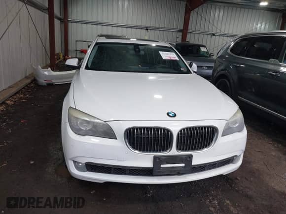 2011 BMW 7 Series 750i xDrive with VIN WBAKC6C54BC394143, listed as a IAAI auction lot 41482533 with 131,241 mi miles and . Bid and sale history available at DreamBid. Image 13.