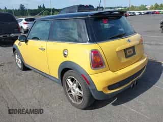 2009 MINI Hardtop S with VIN WMWMF73579TT97876, listed as a IAAI auction lot 42500156 with 115,037 mi miles and . Bid and sale history available at DreamBid. Image 3.
