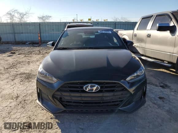2019 Hyundai Veloster 2.0 z VIN KMHTG6AFXKU011920, wystawiony jako Copart lot #40212823 z przebiegiem 47 469 mil mil oraz . Historia ofert i sprzedaży dostępna na DreamBid. Obrazek 5.