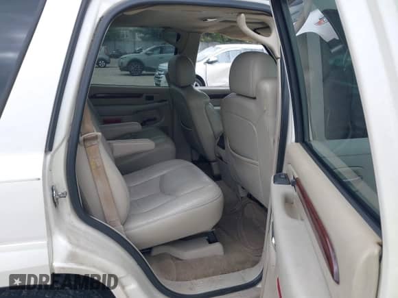 2005 Cadillac Escalade z VIN 1GYEK63N95R231907, wystawiony jako IAAI lot #43433866 z przebiegiem 164 453 mil mil oraz . Historia ofert i sprzedaży dostępna na DreamBid. Obrazek 8.