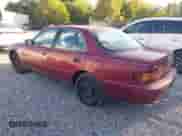 1992 Toyota Camry LE z VIN 4T1SK12E4NU036576, wystawiony jako IAAI lot #43436571 z przebiegiem 160 337 mil mil oraz . Historia ofert i sprzedaży dostępna na DreamBid. Obrazek 3.