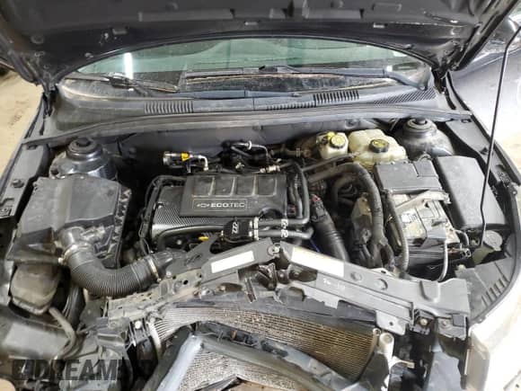 2015 Chevrolet Cruze LT z VIN 1G1PD5SB1F7215958, wystawiony jako Copart lot #50714055 z przebiegiem 98 534 mil mil oraz Szkoda całkowita • Salvage title. Historia ofert i sprzedaży dostępna na DreamBid. Obrazek 12.