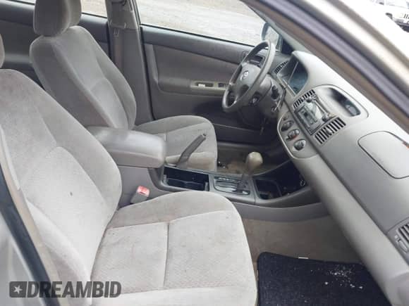 2004 Toyota Camry LE with VIN 4T1BE32K24U939042, listed as a IAAI auction lot 42324099 with 151,784 mi miles and . Bid and sale history available at DreamBid. Image 5.