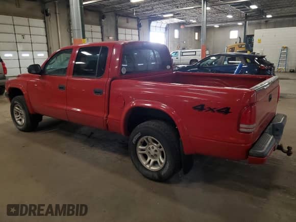2003 Dodge Dakota Sport with VIN 1D7HG38N23S204989, listed as a Copart auction lot 49732705 with 190,921 mi miles and Non repairable. Bid and sale history available at DreamBid. Image 2.
