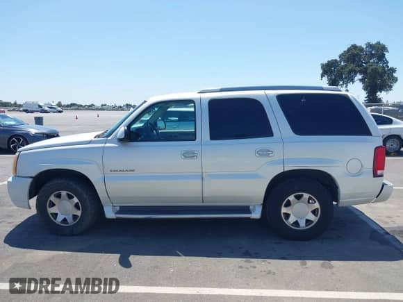 2002 Cadillac Escalade with VIN 1GYEK63N12R116021, listed as a IAAI auction lot 42570605 with 205,922 mi miles and . Bid and sale history available at DreamBid. Image 14.