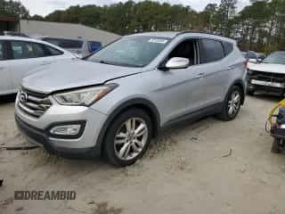 2013 Hyundai Santa Fe Sport z VIN 5XYZU3LA7DG075277, wystawiony jako Copart lot #90100465 z przebiegiem 166 672 mil mil oraz Czysty tytuł • Clean title. Historia ofert i sprzedaży dostępna na DreamBid. Obrazek 1.
