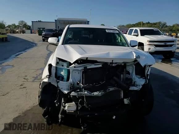 2020 Toyota Tacoma SR with VIN 5TFAX5GN3LX165499, listed as a Copart auction lot 84973885 with 67,043 mi miles and Salvage title. Bid and sale history available at DreamBid. Image 14.