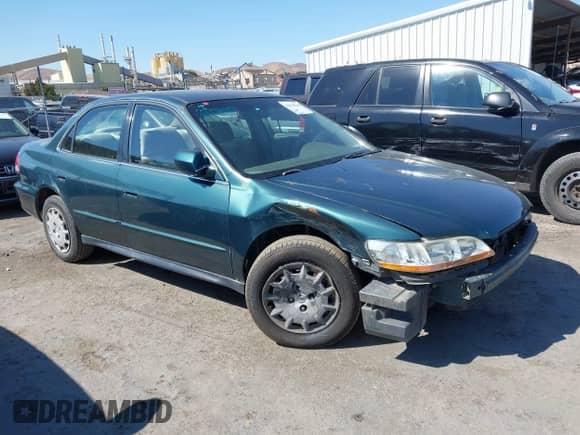 2002 Honda Accord LX with VIN JHMCG66522C014027, listed as a IAAI auction lot 42910646 with 225,058 mi miles and . Bid and sale history available at DreamBid. Image 1.
