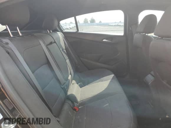 2018 Chevrolet Cruze LT z VIN 3G1BE6SM2JS609784, wystawiony jako Copart lot #72089905 z przebiegiem 71 299 mil mil oraz Szkoda całkowita • Salvage title. Historia ofert i sprzedaży dostępna na DreamBid. Obrazek 10.