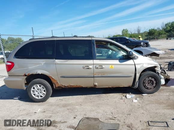 2003 Dodge Caravan Sport with VIN 2D4GP44303R347637, listed as a IAAI auction lot 43084209 with 131,416 mi miles and . Bid and sale history available at DreamBid. Image 13.