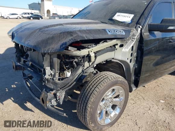 2022 Ram 1500 Big Horn z VIN 1C6RREBT3NN442466, wystawiony jako IAAI lot #40734114 z przebiegiem 22 586 mil mil oraz . Historia ofert i sprzedaży dostępna na DreamBid. Obrazek 6.