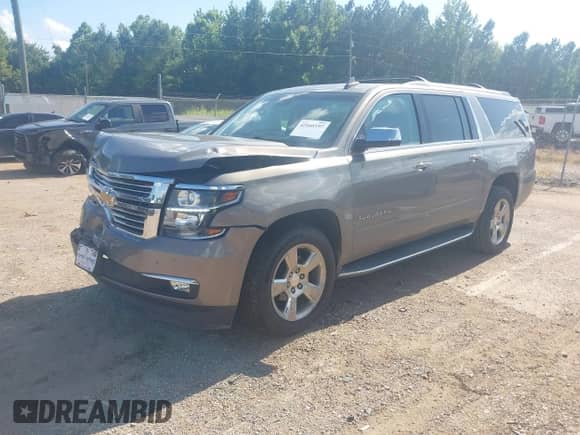 2017 Chevrolet Suburban Premier with VIN 1GNSCJKC5HR309457, listed as a IAAI auction lot 42666197 with 99,932 mi miles and . Bid and sale history available at DreamBid. Image 20.