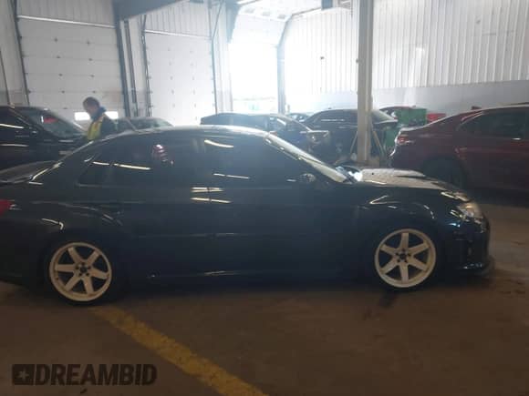 2013 Subaru WRX WRX with VIN JF1GV7F61DG005893, listed as a IAAI auction lot 41551473 with 62,601 mi miles and . Bid and sale history available at DreamBid. Image 13.