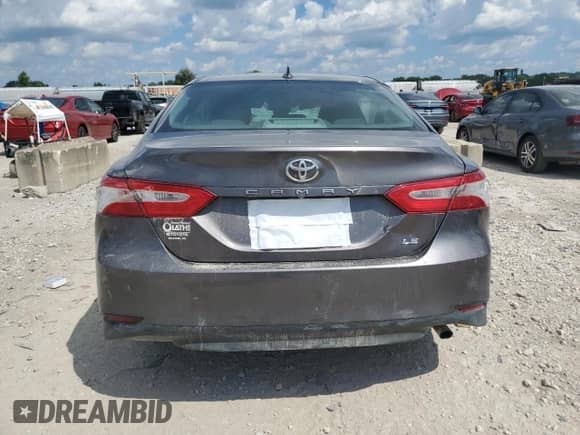 2020 Toyota Camry LE с VIN 4T1C11AK1LU399560, выставлен на аукционе Copart как лот 69238445 с пробегом 160 264 миль миль и Списание • Salvage title. История ставок и продаж доступна на DreamBid. Изображение 6.