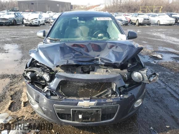 2015 Chevrolet Sonic LTZ z VIN 1G1JF6SB8F4201238, wystawiony jako Copart lot #83118114 z przebiegiem 77 134 mil mil oraz Szkoda całkowita • Salvage title. Historia ofert i sprzedaży dostępna na DreamBid. Obrazek 5.