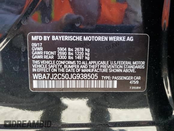 2018 BMW 7 Series 740e xDrive with VIN WBA7J2C50JG938505, listed as a Copart auction lot 50485725 with 94,535 mi miles and Salvage title. Bid and sale history available at DreamBid. Image 12.