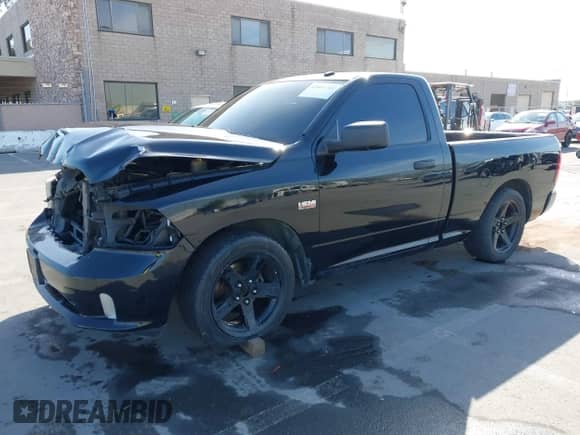 2014 Ram 1500 Express z VIN 3C6JR6ATXEG192303, wystawiony jako IAAI lot #42087281 z przebiegiem 58 597 mil mil oraz . Historia ofert i sprzedaży dostępna na DreamBid. Obrazek 18.