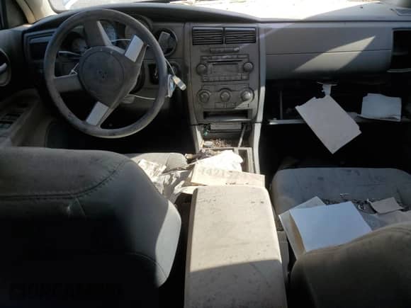 2007 Dodge Charger Police z VIN 2B3LA43H07H768927, wystawiony jako Copart lot #65560305 z przebiegiem 144 275 mil mil oraz Czysty tytuł • Clean title. Historia ofert i sprzedaży dostępna na DreamBid. Obrazek 8.