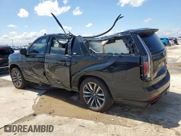 2021 Cadillac Escalade ESV Sport Platinum with VIN 1GYS4RKL9MR295703, listed as a Copart auction lot 54275805 with 77,996 mi miles and Non repairable. Bid and sale history available at DreamBid. Image 2.