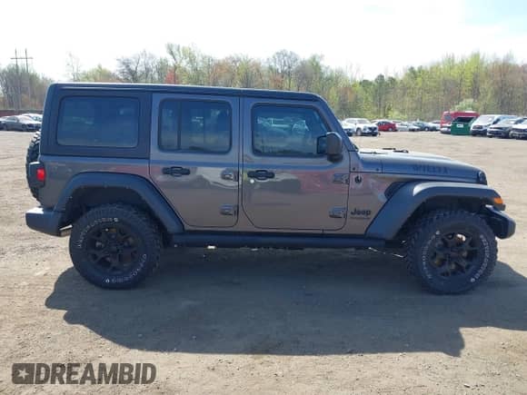 2021 Jeep Wrangler Unlimited Willys with VIN 1C4HJXDG1MW672507, listed as a IAAI auction lot 42084805 with 59,943 mi miles and . Bid and sale history available at DreamBid. Image 13.