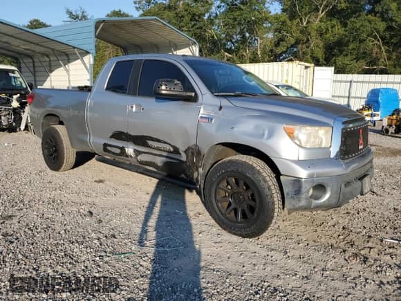 2013 Toyota Tundra с VIN 5TFUW5F1XDX306407, выставлен на аукционе Copart как лот 70155815 с пробегом 243 396 миль миль и Списание • Salvage title. История ставок и продаж доступна на DreamBid. Изображение 4.