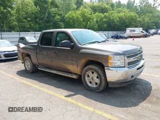 2013 Chevrolet Silverado 1500 LT with VIN 3GCPKSE7XDG213470, listed as a IAAI auction lot 42434525 with 127,506 mi miles and . Bid and sale history available at DreamBid. Image 1.