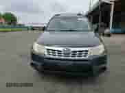 2013 Subaru Forester X z VIN JF2SHABC9DG403830, wystawiony jako Copart lot #66901685 z przebiegiem 183 552 mil mil oraz Szkoda całkowita • Salvage title. Historia ofert i sprzedaży dostępna na DreamBid. Obrazek 13.