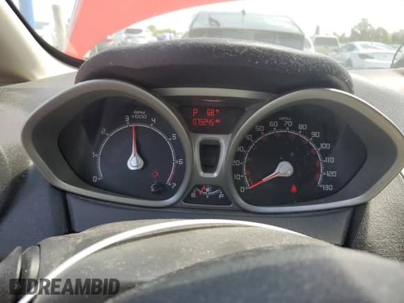 2012 Ford Fiesta SES с VIN 3FADP4FJ7CM173946, выставлен на аукционе Copart как лот 58439135 с пробегом 79 245 миль миль и Списание • Salvage title. История ставок и продаж доступна на DreamBid. Изображение 9.