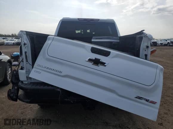 2023 Chevrolet Silverado 1500 ZR2 with VIN 3GCUDHEL5PG153230, listed as a Copart auction lot 54396335 with 46,887 mi miles and Salvage title. Bid and sale history available at DreamBid. Image 6.