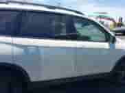 2019 Honda Passport Elite with VIN 5FNYF8H05KB009575, listed as a IAAI auction lot 42804678 with 70,468 mi miles and . Bid and sale history available at DreamBid. Image 14.
