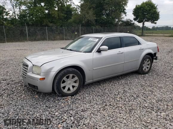2005 Chrysler 300 Touring с VIN 2C3AA53G85H594397, выставлен на аукционе Copart как лот 68769545 с пробегом 169 259 миль миль и Списание • Salvage title. История ставок и продаж доступна на DreamBid. Изображение 1.