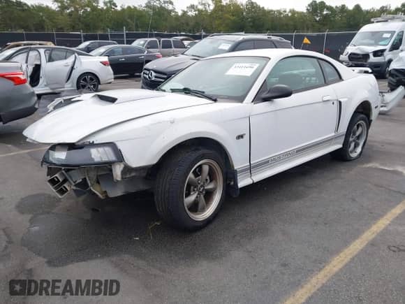 2003 Ford Mustang GT Deluxe z VIN 1FAFP42X83F367937, wystawiony jako IAAI lot #43411690 z przebiegiem Nie podano mil oraz . Historia ofert i sprzedaży dostępna na DreamBid. Obrazek 18.