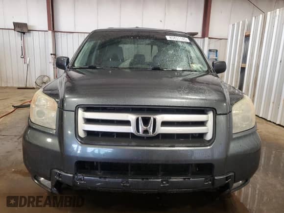 2006 Honda Pilot EX z VIN 5FNYF18476B011358, wystawiony jako Copart lot #85831145 z przebiegiem 237 177 mil mil oraz Szkoda całkowita • Salvage title. Historia ofert i sprzedaży dostępna na DreamBid. Obrazek 5.