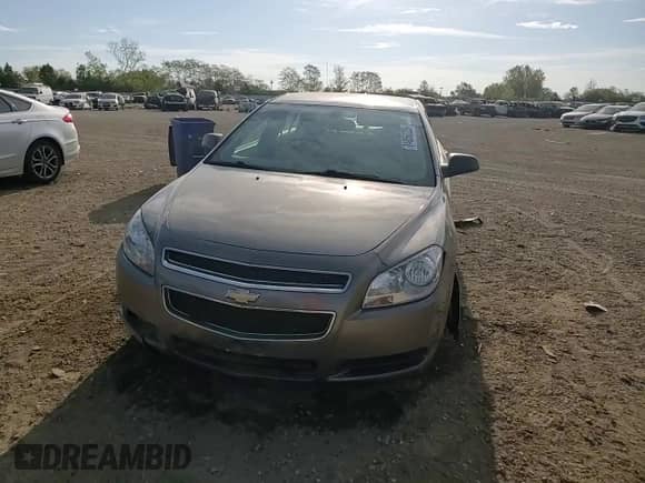 2012 Chevrolet Malibu 1LS z VIN 1G1ZB5E06CF322160, wystawiony jako Copart lot #84866225 z przebiegiem 84 438 mil mil oraz Szkoda całkowita • Salvage title. Historia ofert i sprzedaży dostępna na DreamBid. Obrazek 13.