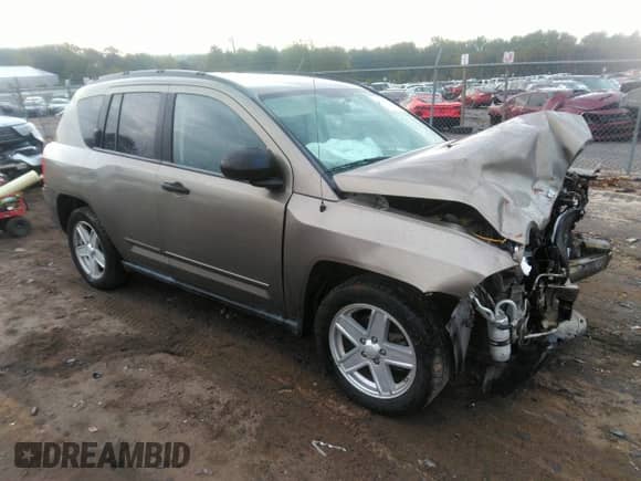 2008 Jeep Compass Sport with VIN 1J8FT47W58D616728, listed as a IAAI auction lot 43398564 with 121,179 mi miles and . Bid and sale history available at DreamBid. Image 1.