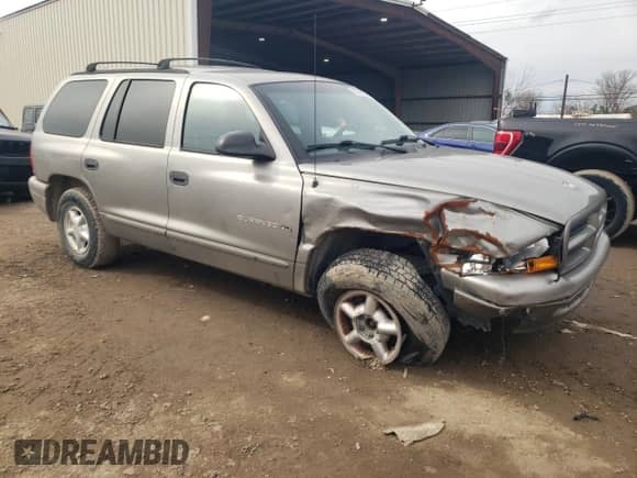 2000 Dodge Durango z VIN 1B4HR28Y3YF280758, wystawiony jako Copart lot #89098875 z przebiegiem 99 441 mil mil oraz Szkoda całkowita • Salvage title. Historia ofert i sprzedaży dostępna na DreamBid. Obrazek 4.