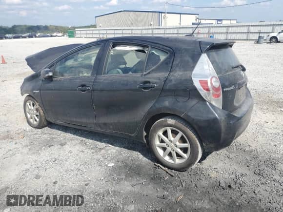 2012 Toyota Prius Four z VIN JTDKDTB34C1512557, wystawiony jako Copart lot #81591185 z przebiegiem Nie podano mil oraz Szkoda całkowita • Salvage title. Historia ofert i sprzedaży dostępna na DreamBid. Obrazek 2.