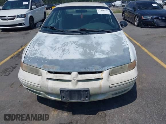 1999 Dodge Stratus with VIN 1B3EJ46X8XN513543, listed as a IAAI auction lot 42996786 with 157,481 mi miles and . Bid and sale history available at DreamBid. Image 6.