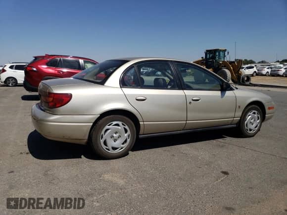 2000 Saturn SL with VIN 1G8ZK5274YZ103237, listed as a Copart auction lot 60558105 with 126,320 mi miles and Salvage title. Bid and sale history available at DreamBid. Image 3.