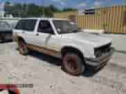 1993 Chevrolet Blazer LS с VIN 1GNCS13W7P2144096, выставлен на аукционе Copart как лот 66123774 с пробегом Не указан миль и Списание • Salvage title. История ставок и продаж доступна на DreamBid. Изображение 4.