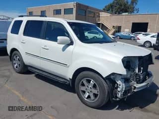 2011 Honda Pilot Touring with VIN 5FNYF3H98BB034357, listed as a IAAI auction lot 42939634 with 116,346 mi miles and . Bid and sale history available at DreamBid. Image 1.