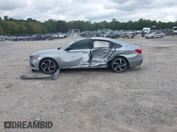 2021 Honda Accord Sport z VIN 1HGCV2F32MA016889, wystawiony jako IAAI lot #43328920 z przebiegiem 89 163 mil mil oraz . Historia ofert i sprzedaży dostępna na DreamBid. Obrazek 14.