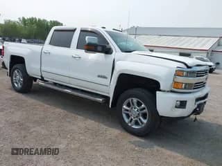 2016 Chevrolet Silverado 2500HD High Country z VIN 1GC1KXE89GF141727, wystawiony jako IAAI lot #42390349 z przebiegiem 187 706 mil mil oraz . Historia ofert i sprzedaży dostępna na DreamBid. Obrazek 1.