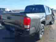 2017 Toyota Tacoma TRD Off Road with VIN 5TFAZ5CN2HX027623, listed as a IAAI auction lot 41731461 with 103,232 mi miles and . Bid and sale history available at DreamBid. Image 4.